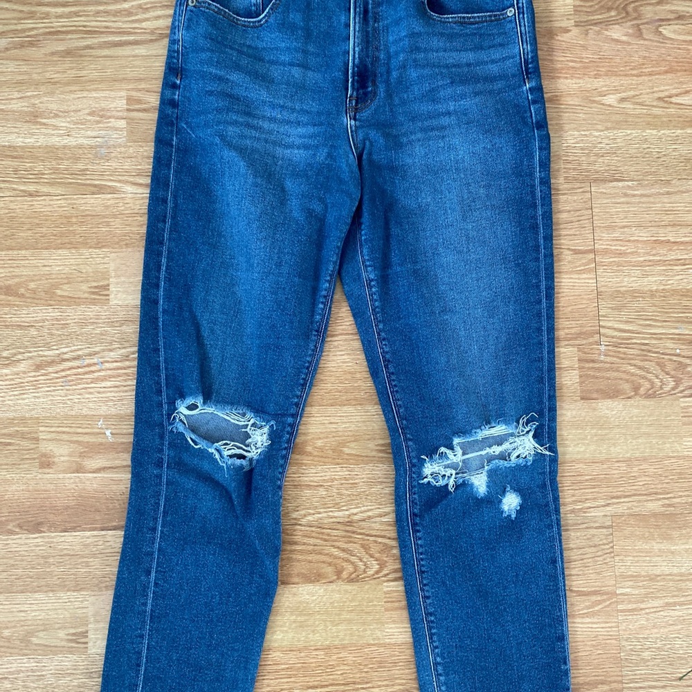 Distressed Blue Denim Jeans